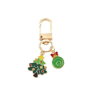 Golden metal keychain with green enamel Christmas tree and swirled ornament charms