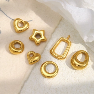 Flat lay of 18K gold plated stainless steel geometric hollow pendants for DIY jewelry