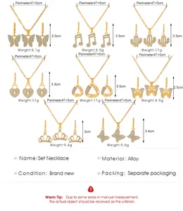 Size guide for crown and butterfly jewelry set with necklace and earring dimensions
