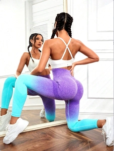 Close-up of high-waisted seamless ombre yoga leggings with ruched butt lifting detail