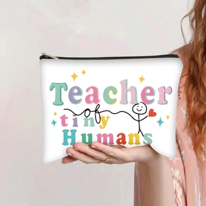 Detail of teacher-themed canvas pouch showing Teacher of Tiny Humans print and zipper