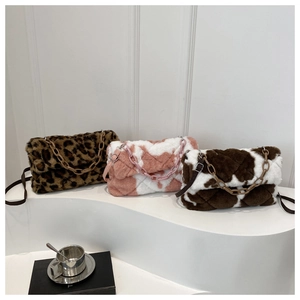 Plush shoulder bags with leopard, cow, and pink checkered patterns and chain straps