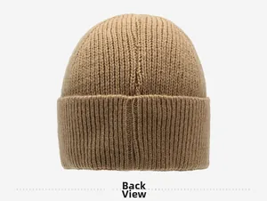 Back view of khaki knitted beanie showing textured vertical ribbed patterns and warm fabric