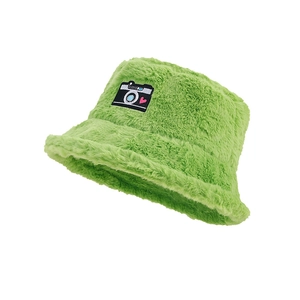 Green plush bucket hat with camera patch for women shown from a 45-degree angle