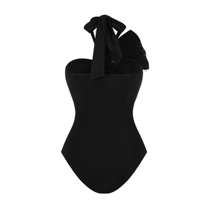 Detail of black one-piece swimsuit with bow knot and elegant heart-shaped neckline