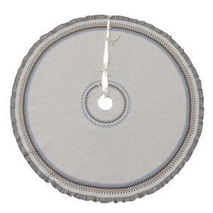 Knitted Christmas tree skirt with Fair Isle geometric patterns and grey fringe tassels