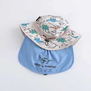 Detailed view of kids breathable dinosaur print sun hat with protective neck flap and drawstring