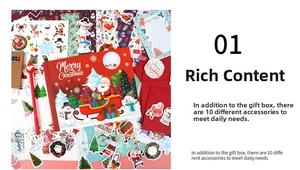 Vue détaillée du set journal DIY de Noël avec autocollants, enveloppes et stylos festifs