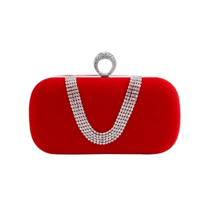 Elegant red velvet evening clutch bag with sparkling diamond-encrusted ring handle