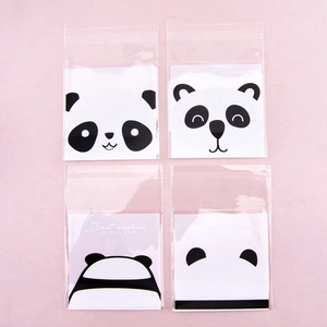 Set of four transparent panda animal cookie bags with Best Wishes cards and floral accents