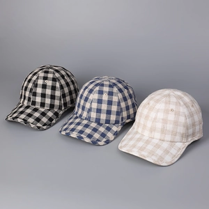 Three premium linen plaid baseball caps in classic black, blue, and brown check patterns