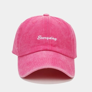 Detail of rose pink washed cotton baseball cap with white Everyday embroidery