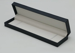 Detail view of rectangular black PU leather watch box with soft grey flocking lining