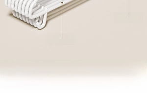 Detail of thickened steel core clothes hanger with non-slip coating and shoulder strap hook