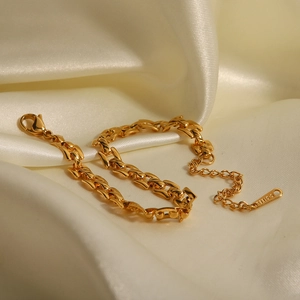 Elegant 18K gold-plated stainless steel chain bracelet on premium silk background
