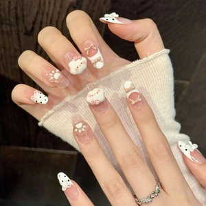 Handgefertigte 3D-Nagelkunst mit rosa Schleifen und Bären auf langen ovalen Kunstnägeln