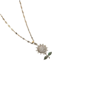 Minimalist sunflower pendant necklace with zircons and green gems on silver flat link chain