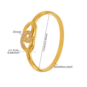 Detail view of gold stainless steel double ring bracelet with zircon and 6.0cm diameter