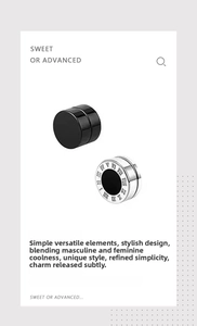 Detail view of magnetic stainless steel stud earrings with Roman numeral engraving