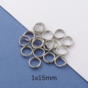 Macro shot of 1x15mm polished stainless steel double jump rings for DIY jewelry projects