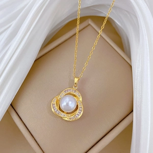 Luxurious bird nest pearl necklace with zircon inlay on a soft silk background