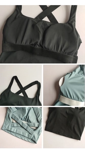 Detail eines Cross-Back Yoga-BHs mit Elastikband in Schwarz und Blaugrau-Stoffen