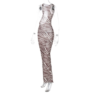 Detail of sheer zebra print mesh fabric on a sleeveless bodycon maxi dress for women