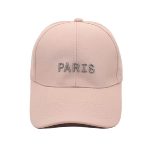 Detailed close-up of pink cotton baseball cap featuring silver Paris letter embroidery