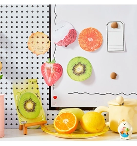 Creative fruit shaped sticky notes featuring strawberry and orange designs for journaling