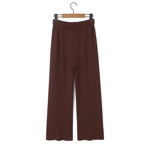 Detail of dark brown high waisted knitted wide leg pants with elastic waistband