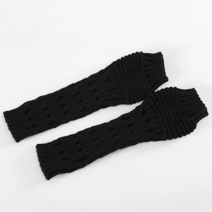 Detailed knit texture of black cable knit arm warmers against a clean white background