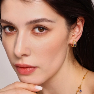 Rainbow glass stone ear cuff in copper gold plating with vibrant multi-color gemstones
