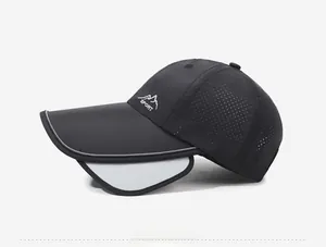 Detail of outdoor cap featuring extended brim, side sun flaps and breathable mesh