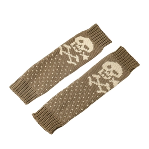 Detail of brown knit arm sleeves featuring beige skull patterns and white polka dots