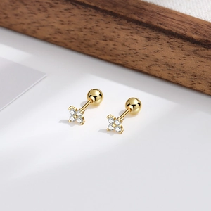 Elegant gold S925 sterling silver four-leaf clover stud earrings with sparkling diamonds