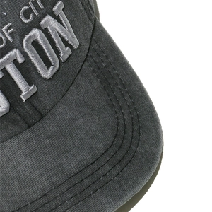 Close-up of Boston embroidery and parallel stitching on washed cotton baseball cap