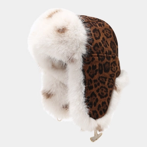 Winter leopard print trapper hat with white fluffy fur trim and adjustable chin strap
