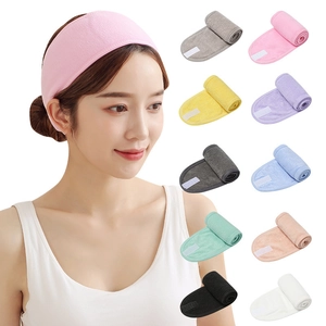Detailed grid of microfiber spa headbands in various colors with adjustable velcro