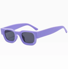 Detail view of bold purple square frame sunglasses with dark grey lenses in 45-degree angle