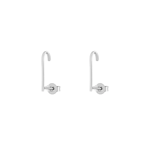 Macro detail of silver J-shape minimalist earrings with high polished mirror finish