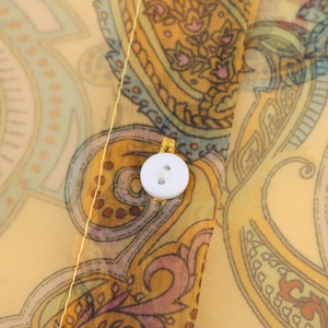Retro paisley organza blouse featuring lantern sleeves and delicate white button details