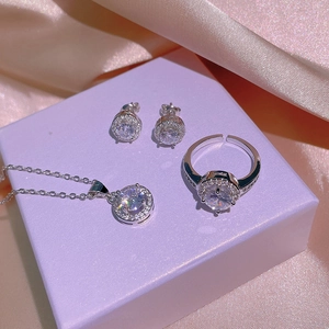 Elegant silver halo jewelry set featuring necklace earrings and open ring with zircons