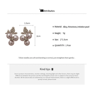 Detail view showing dimensions of flower pearl earrings with crystals and silver needle