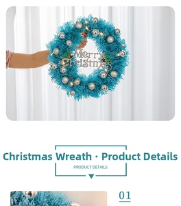 Detail of blue Christmas wreath with silver ornaments and warm LED lights