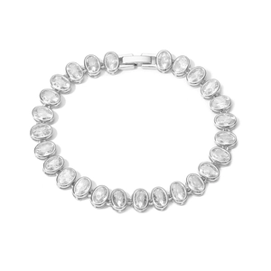 Macro shot of silver tennis bracelet featuring oval-cut cubic zirconia in a secure clasp
