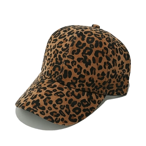 Detailed close-up of leopard print baseball cap featuring classic wild pattern and curved brim