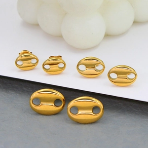 Polished gold coffee bean stud earrings in three sizes on a minimalist background