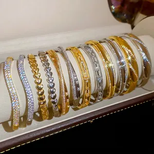 Elegant 18k gold plated bangle set with cubic zirconia in gold and silver finishes