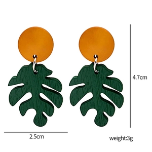 Tropical monstera leaf earrings with orange stud detail, measuring 4.7cm in height