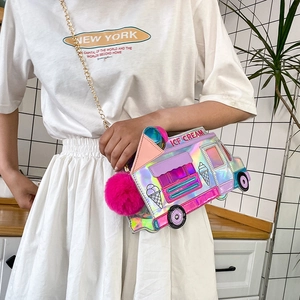 Close-up of holographic ice cream truck crossbody bag with metal chain and pink pompom